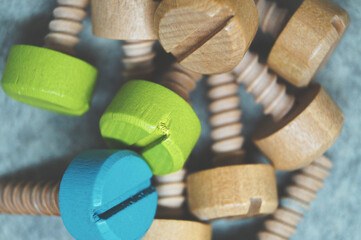 wooden colored screws tool detail for repair original design wallpaper children's toys craftsmanship 