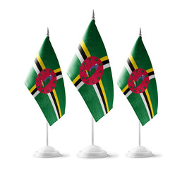 Small national flags of the Dominica on a white background