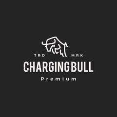 charging bull hipster vintage logo vector icon illustration