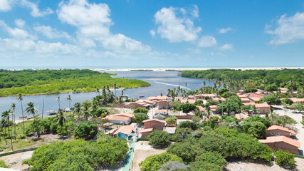 Aerial view of Atins, Brazil, in the region of Maranhao. Blue sky and white clodus in the background