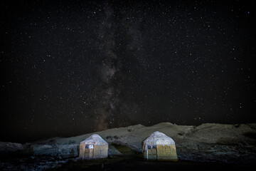 Yurts on the shore of the Aral Sea on stars night, Karakalpakstan