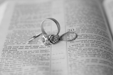wedding rings on book