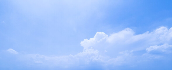 The beautiful clouds on the blue sky. Sky and cloud backgrounds for real estate, airline, and travel advertising.