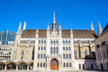 Fototapeta na wymiar Exterior of Guildhall in the City of London, England against a cloudless sky