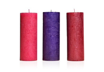 Three different textured candles on an isolated white background