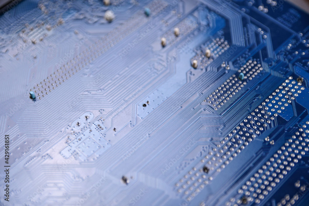 Poster Computer motherboard background and electronical components cpu gpu memory and different sockets for video card close up