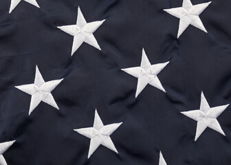 gray star on blue background an American flag.