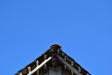 Fototapeta na wymiar minimalist of roof with blue sky background 