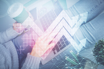 Double exposure of woman hands typing on computer and arrows drawing. Success concept.