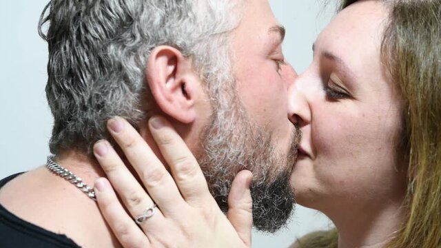 A man and woman kissing