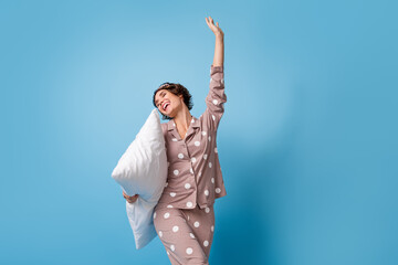 Photo of young excited girl happy positive smile have fun enjoy morning awake wear pajamas isolated...