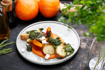 Baked vegetables on pumpkin puree. Vegetarian cooking.
Culinary photography. Suggestion to serve the dish.