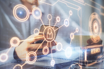 Double exposure of man's hands holding and using a phone and social network theme drawing.