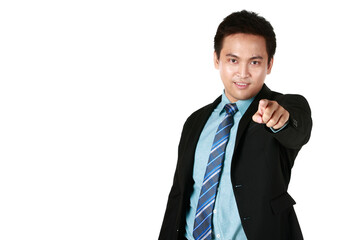 Young Asian man smiling standing wearing black suit and pointing forward.isolated on a white background. Concept businessman success command order.