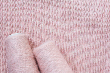 Fototapeta na wymiar Background texture of pink pattern knitted fabric made of angora or wool.