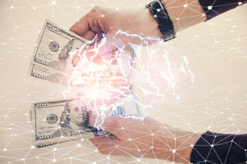 Multi exposure of brain drawing hologram and us dollars bills and man hands. Ai invest concept