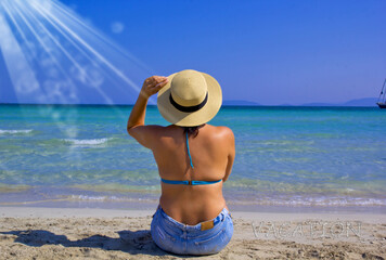 beautiful young woman in bikini on the beach	