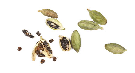 Green cardamom pods pile isolated on white background, top view