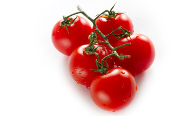 cherry tomatoes on a white background