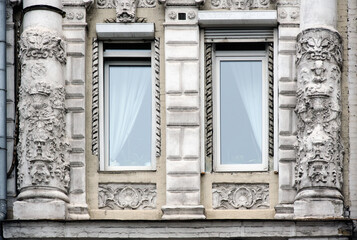 Relief on columns on facade of an old building in Kyiv Ukraine