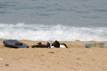 Fototapeta na wymiar Surfer's kit on the beach at Jeffreys Bay