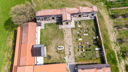 Christian cemetery in the countryside hills Italy