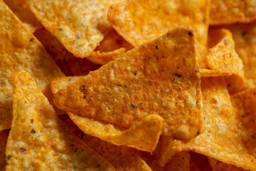 Mexican Corn Chips triangle-shaped nachos with cheese flavor close-up