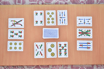 truco cards game set on wooden plank ,Spanish card game CARTAS ESPENOLAS, Gambling, Casino, Concept background