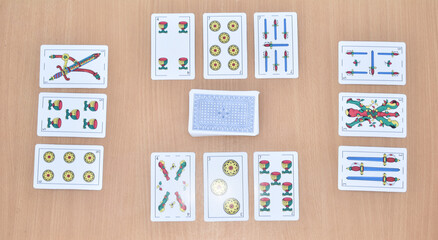 truco cards game set on wooden plank ,Spanish card game CARTAS ESPENOLAS, Gambling, Casino, Concept...