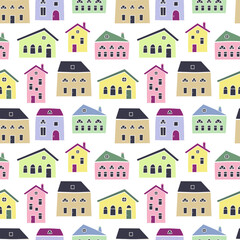 Vector seamless pattern of cute colorful houses isolated on white background. Sweet home print. Wallpaper