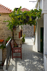 A small street in Solta, a small town on one of the many islands that can be reached from Split in Croatia.
