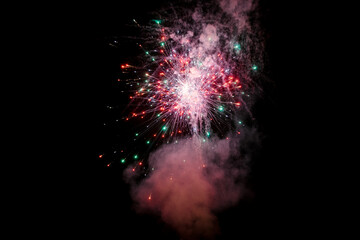 colored night explosions in black sky. beautiful multi colored fireworks in night sky. New years...