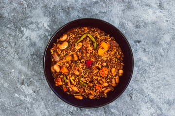 vegan quinoa risotto with sweet potatoes capsicum and green beans in spicy tomato sauce, healthy plant-based food