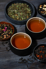assortment of fragrant tea. black, floral and herbal drinks, vertical top view