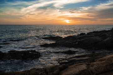 sunset over the sea with dramatic sky