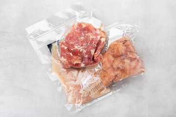 frozen fish fillet, chicken fillet, minced meat in vacuum packaging, ready food delivery, food storage
