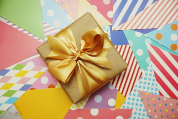 Gift box present on colorful background