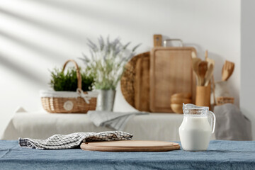 Fresh milk on the kitchen table in a beautiful morning and spring sunshine 