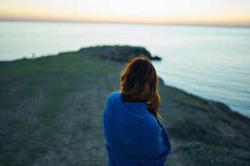 woman in a blue plaid in the mountains nature fresh air