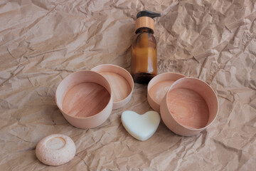 Eco-friendly disposable packaging,   plastic free lifestyle.   On a paper background there are two...