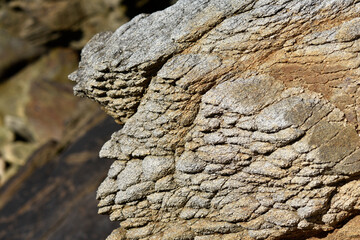 Different layers of rock, texture of stone, geological image of stone.