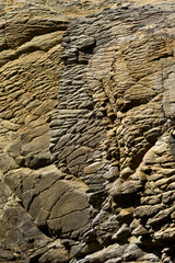 Different layers of rock, texture of stone, geological image of stone.