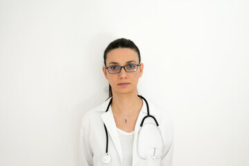 Fototapeta premium Portrait of doctor in different angle and lights in front of white wall. Selective Focus Model Face.