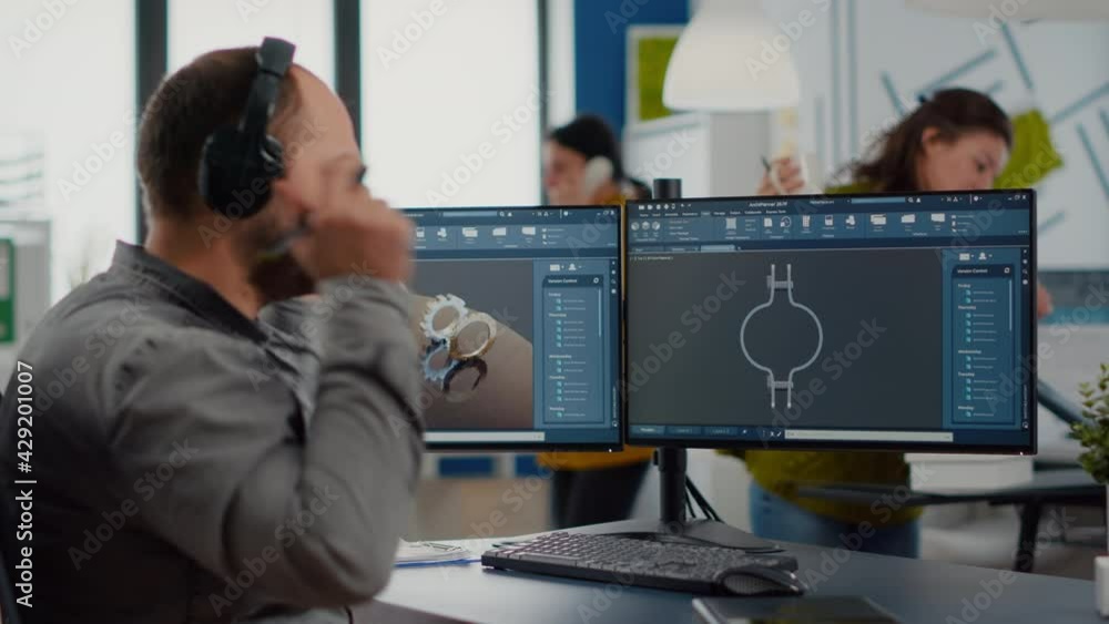Poster designer engineer putting on headphones working with technical cad program, analysing 3d gears proto