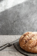 Bread in basket on marbled background