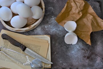 Fototapeta na wymiar eggs and flour on the table