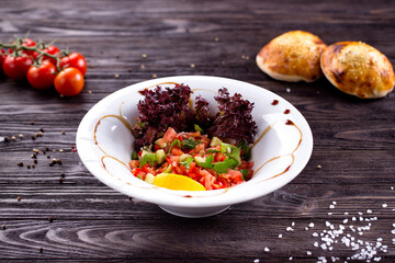 Assorted Middle Eastern and arabic dishes on a dark rustic background. Hummus, tabbouleh, pita, meat kebab, falafel, baklava. Halal food. Top view. Turkish foods, Turkish pizza, Turkish breakfast