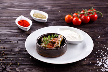Assorted Middle Eastern and arabic dishes on a dark rustic background. Hummus, tabbouleh, pita, meat kebab, falafel, baklava. Halal food. Top view. Turkish foods, Turkish pizza, Turkish breakfast