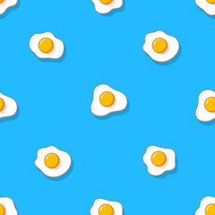 Fried eggs seamless pattern. Simple design for textile wrapping paper Vector illustration isolated on blue background