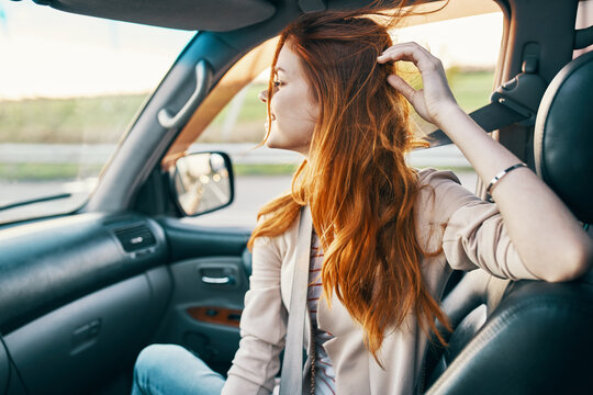 Woman In Front Seat Of Car Turned Back And Window Design Salon Travel Companion Travel Tourism